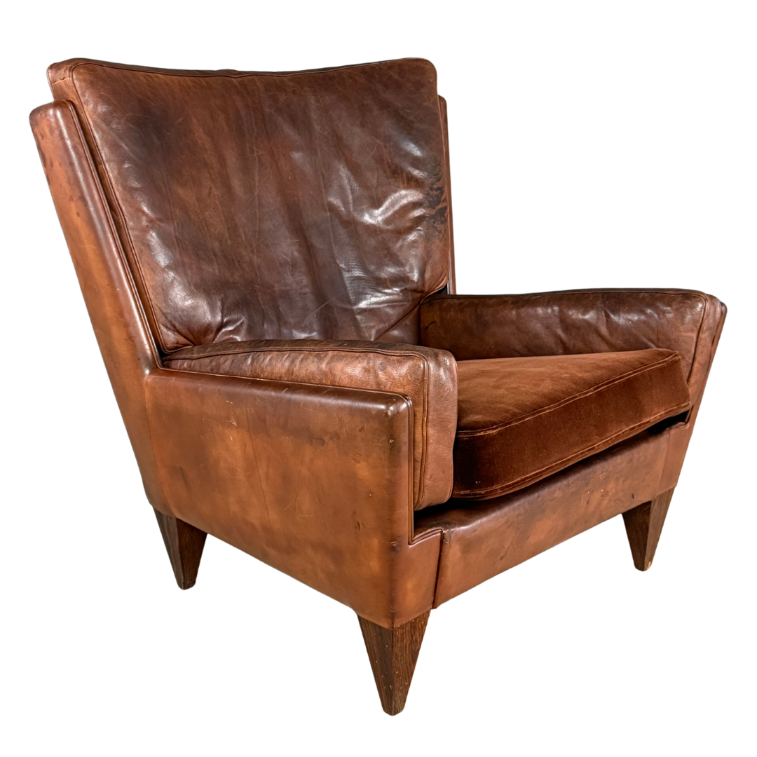 1960s Illum Wikkelso : Model V11 leather lounge chair + ottoman