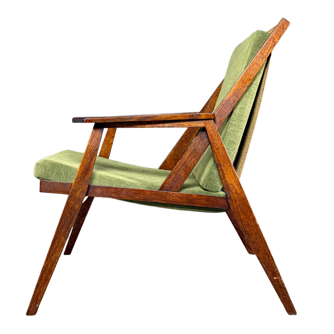 1950s Miroslav Navrátil : dark-stained oakwood armchair, linen straps