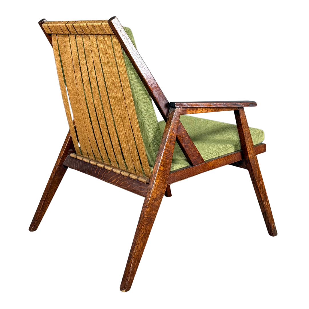 1950s Miroslav Navrátil : dark-stained oakwood armchair, linen straps