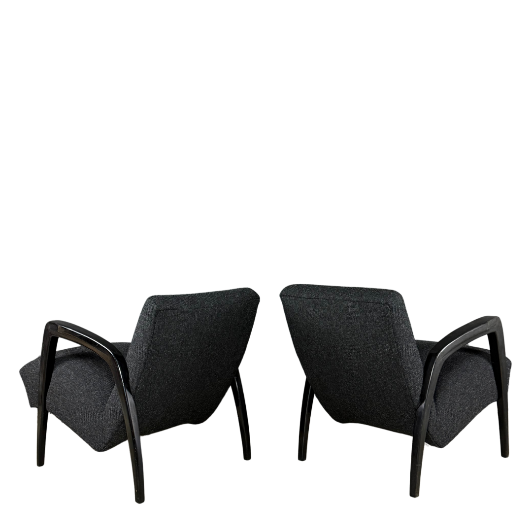 1940s Jan Vanek : pair sculpted dark-stained lounge chairs