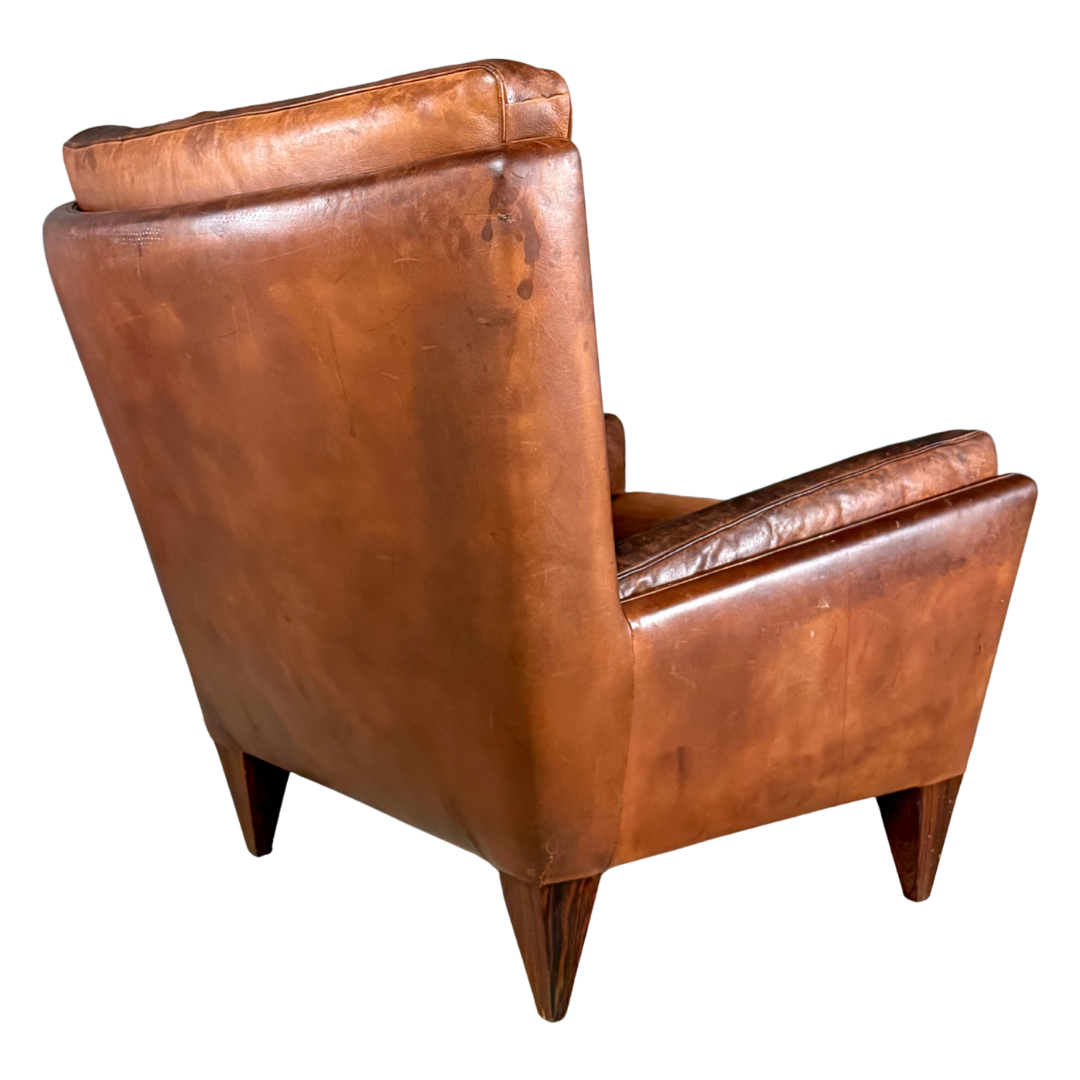 1960s Illum Wikkelso : Model V11 leather lounge chair + ottoman