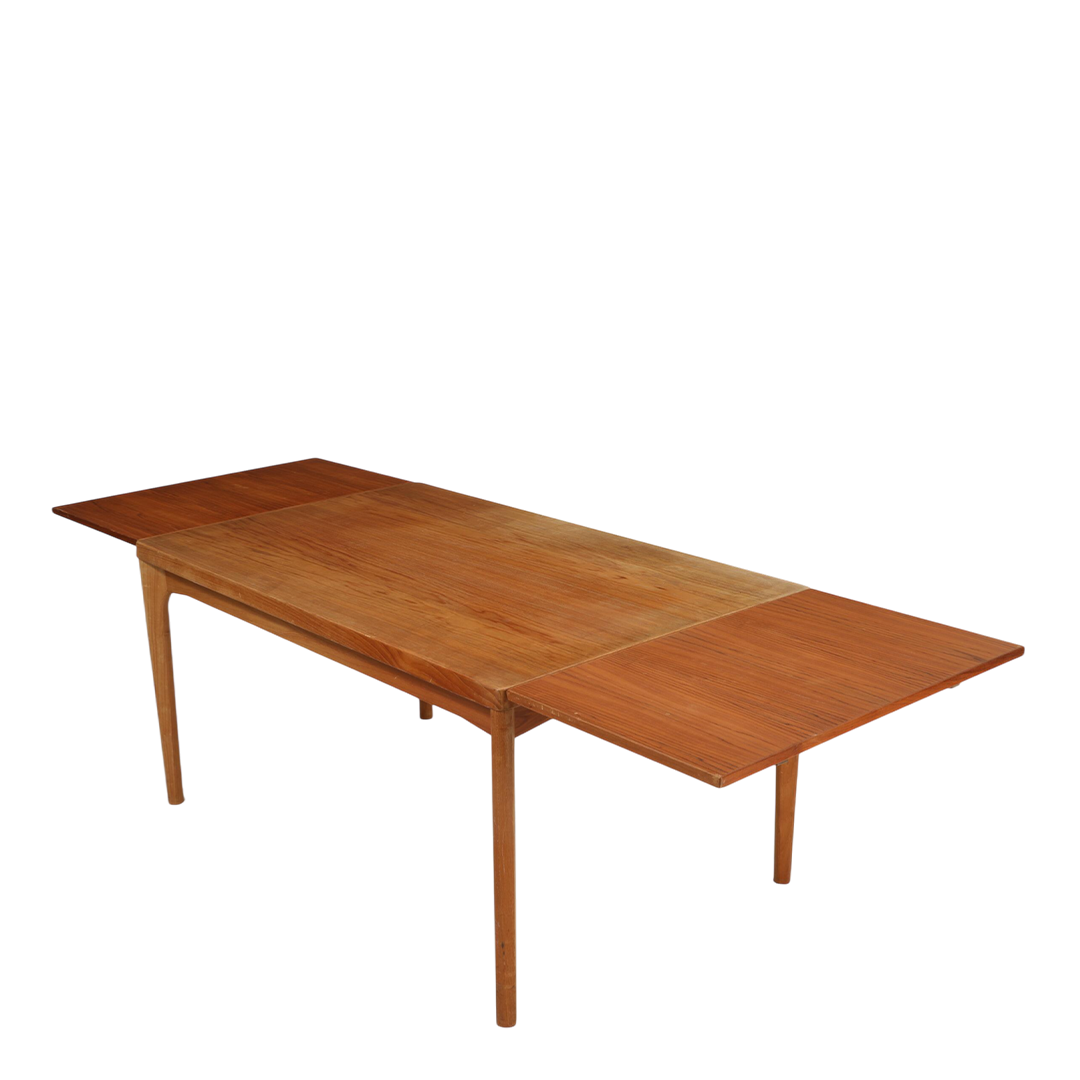 1960s Henry Kjærnulf : teakwood dining table w/hidden extensions