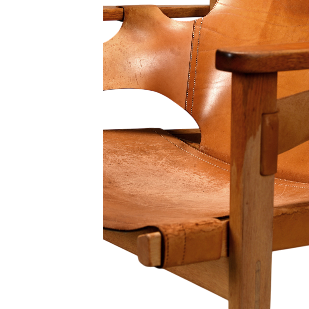 1950s Carl-Axel Acking : "Trienna" saddle leather & oak armchair
