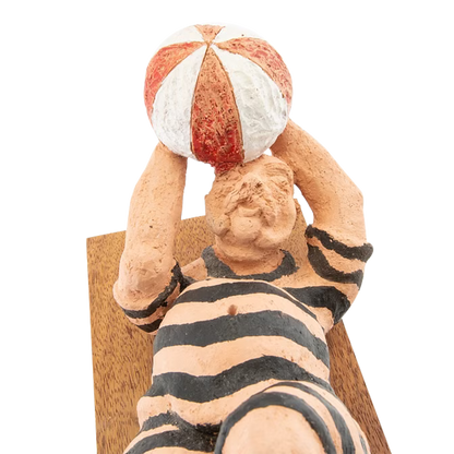 Late 20thc Tommy Assarsson : "swimmer with ball" polychrome terracotta