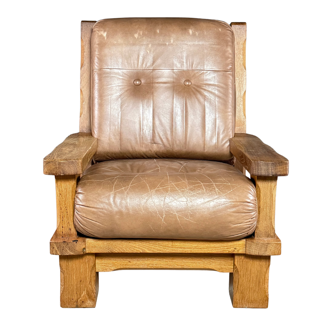 1970s French :  Néo-Rustique solid oakwood and leather lounge chair
