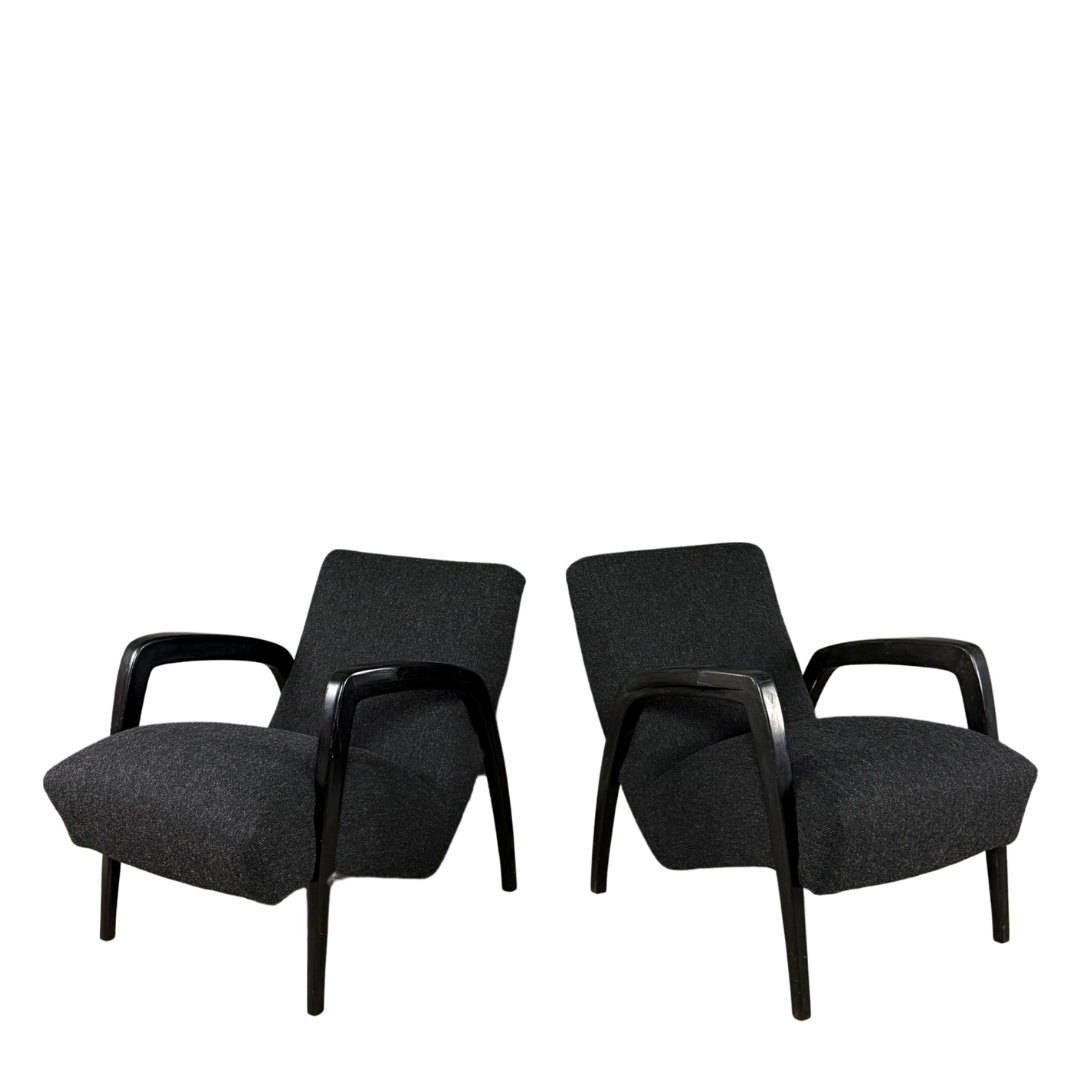 1940s Jan Vanek : pair sculpted dark-stained lounge chairs