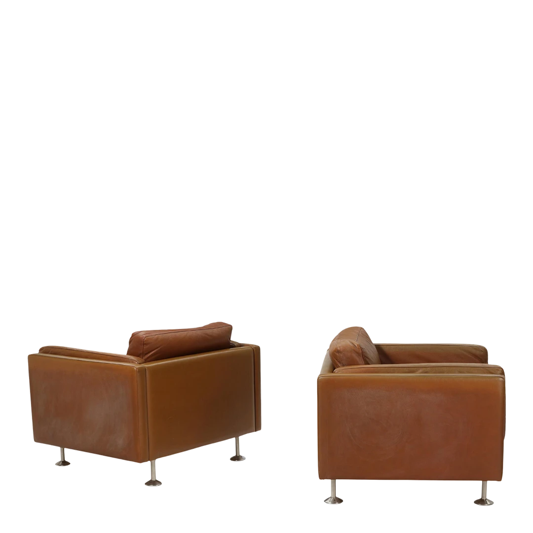 Pair Illum Wikkelsø : leather & steel lounge chairs, Denmark