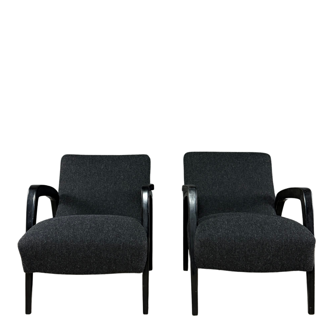 1940s Jan Vanek : pair sculpted dark-stained lounge chairs