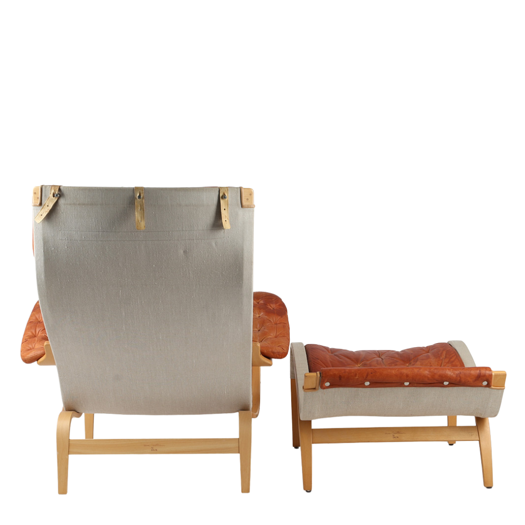 1970s Bruno Mathsson : rust orange leather "Pernilla" lounge chair + ottoman