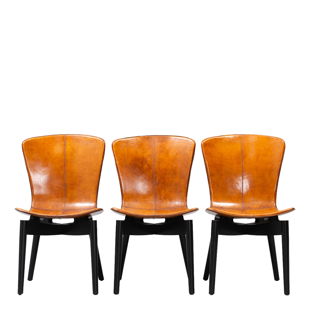 c2010 Michael W. Dreeben : shell dining chairs in cognac leather for Mater