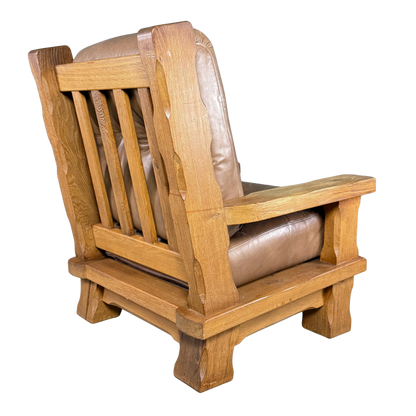 1970s French :  Néo-Rustique solid oakwood and leather lounge chair