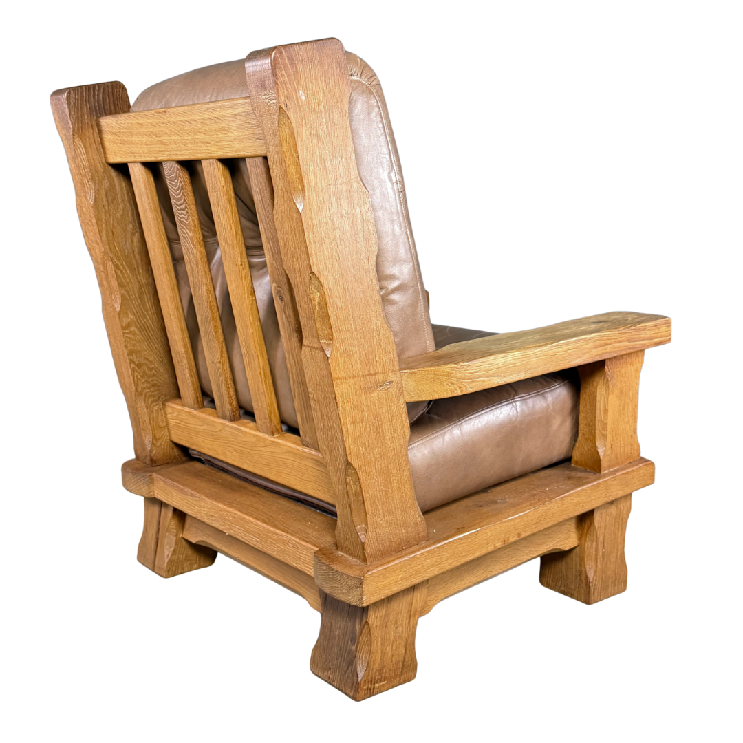 1970s French :  Néo-Rustique solid oakwood and leather lounge chair