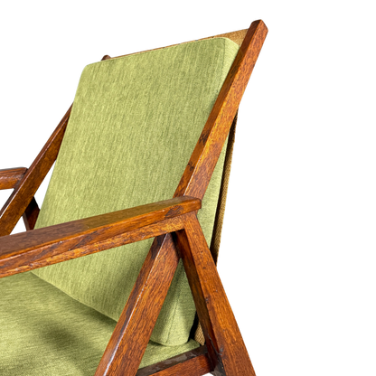 1950s Miroslav Navrátil : dark-stained oakwood armchair, linen straps