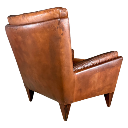 1960s Illum Wikkelso : Model V11 leather lounge chair + ottoman