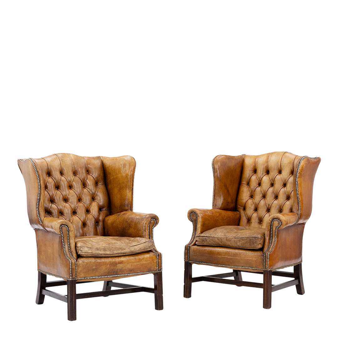 Pair English 20thc : George II style tufted leather wingchairs