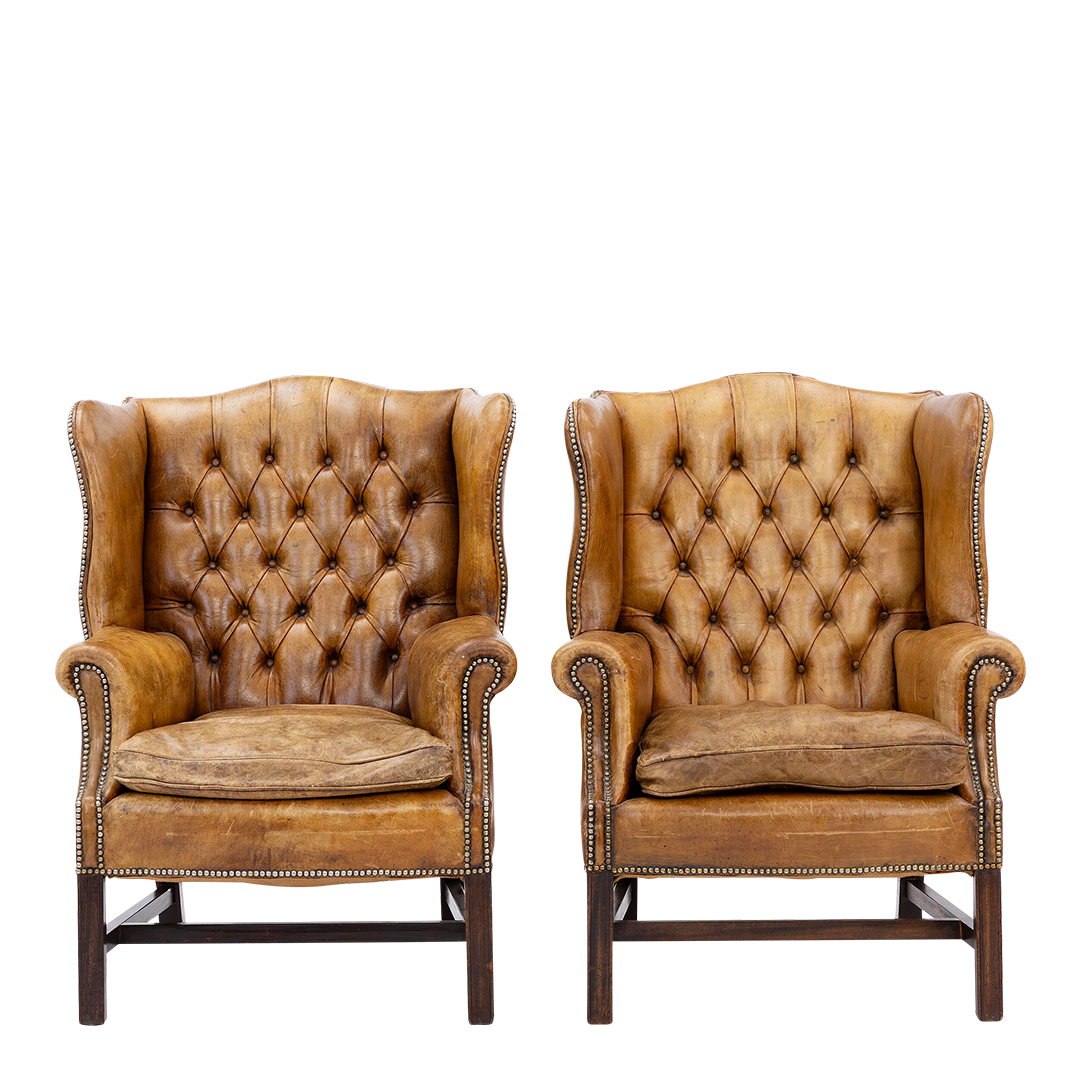 Pair English 20thc : George II style tufted leather wingchairs