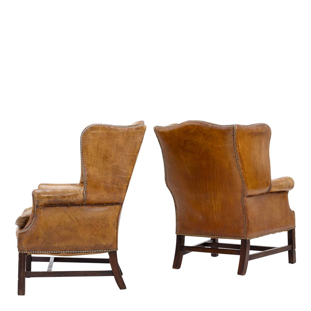 Pair English 20thc : George II style tufted leather wingchairs