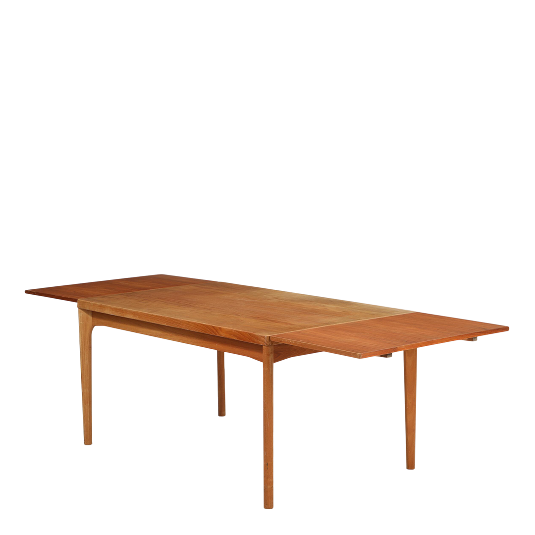 1960s Henry Kjærnulf : teakwood dining table w/hidden extensions