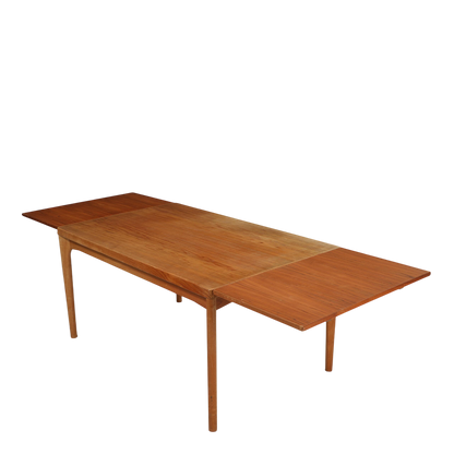 1960s Henry Kjærnulf : teakwood dining table w/hidden extensions
