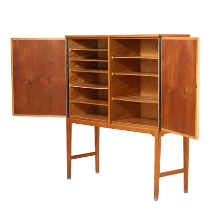 1960s Verner Birksholm : beech & teak 55" tall cabinet on stand