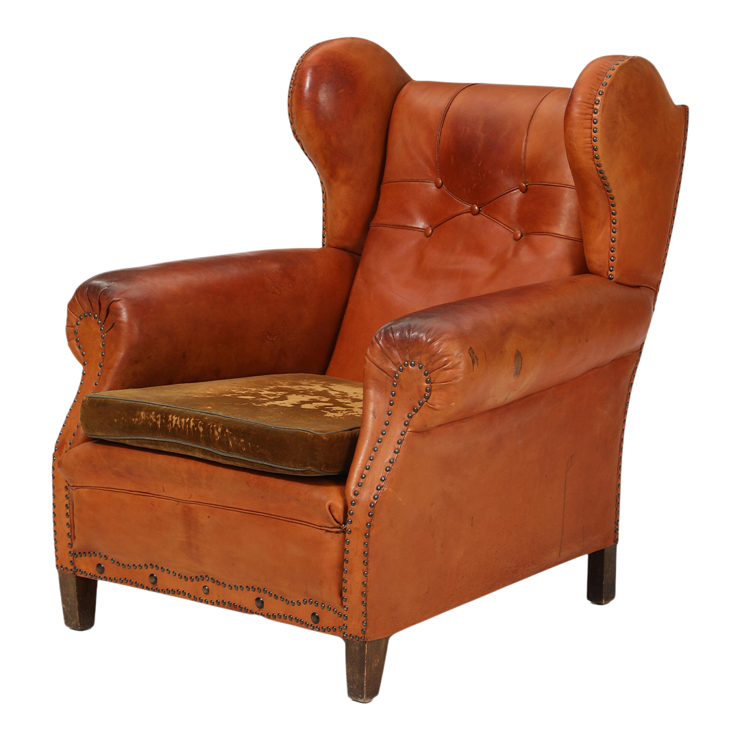 1950 Danish : cognac leather English style wingback clubchair