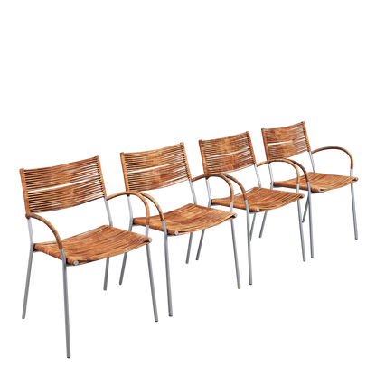 1990s Tito Agnoli : four "Miss B" leather cord dining chairs