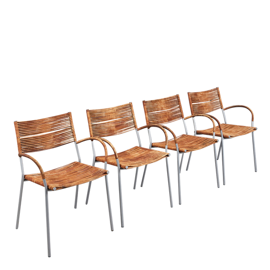 1990s Tito Agnoli : four "Miss B" leather cord dining chairs