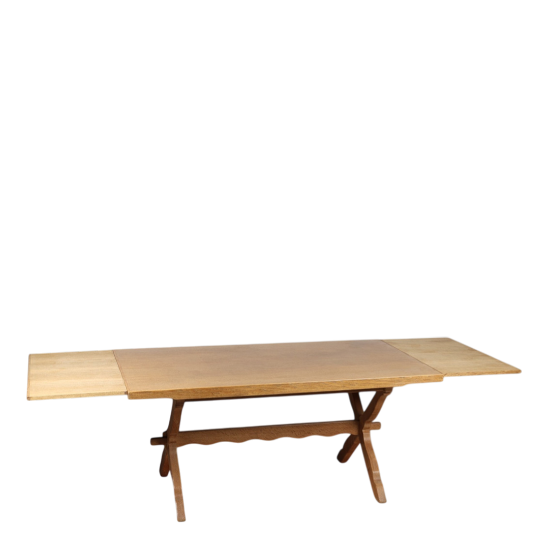1960s Kjærnulf style: solid oak 63" dining table w/Dutch extensions