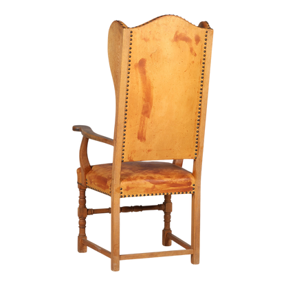 Late 1920s Swedish : 50" tall baroque style armchair w/cognac leather