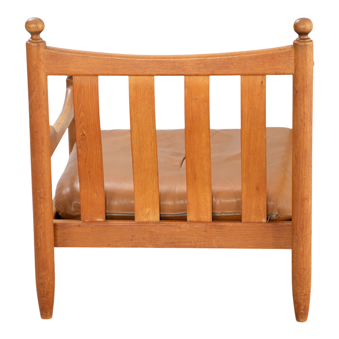 1970s German : solid oakwood and cognac leather lounge chair