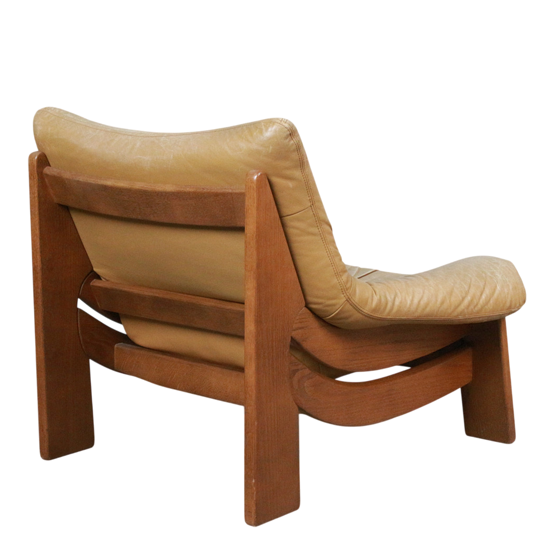 1960s Maison Regain : oak & leather Provençal brutalist lounge chair