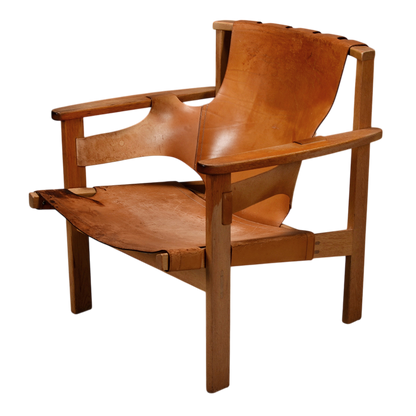 1950s Carl-Axel Acking : "Trienna" saddle leather & oak armchair