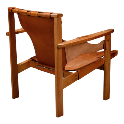 1950s Carl-Axel Acking : "Trienna" saddle leather & oak armchair